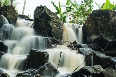 curug gamelan in Salatiga, Central Java. Indonesia. Waerfalls with giant rocks. Long Exposure Photography. Blurred Motions.