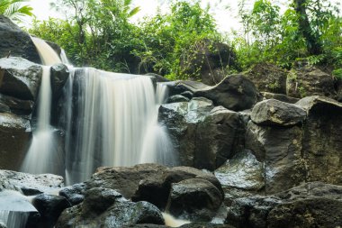 curug gamelan in Salatiga, Central Java. Indonesia. Waerfalls with giant rocks. Long Exposure Photography. Blurred Motions.