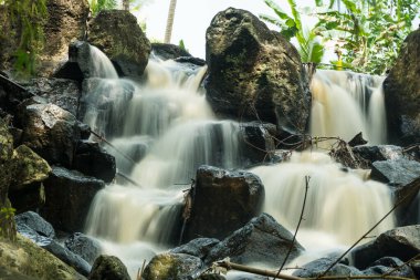 curug gamelan in Salatiga, Central Java. Indonesia. Waerfalls with giant rocks. Long Exposure Photography. Blurred Motions.