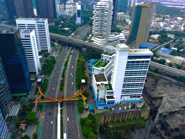 4 February 2023. Pedestrian Bridge named Phinisi on Sudirman Street, Jakarta. Indonesia. Aerial footage taken by drone.