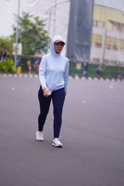 6 Temmuz 2025. Surabaya, Endonezya. Otomobilsiz Gündeki İnsanlar.