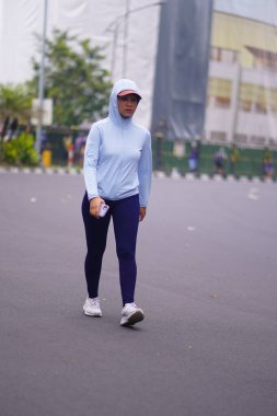 6 Temmuz 2025. Surabaya, Endonezya. Otomobilsiz Gündeki İnsanlar.