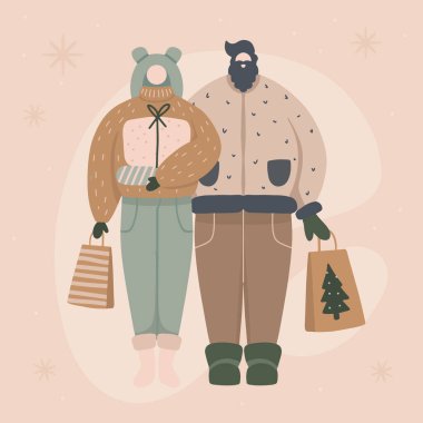 Mutlu çift Noel hediyeleri ve çantaları alıyor ve tutuyor. Aile Noel kutlaması. Kış tatili konsepti alışverişi