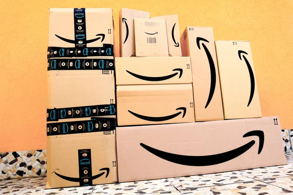 stock image amazon packages, boxes delivery to the door