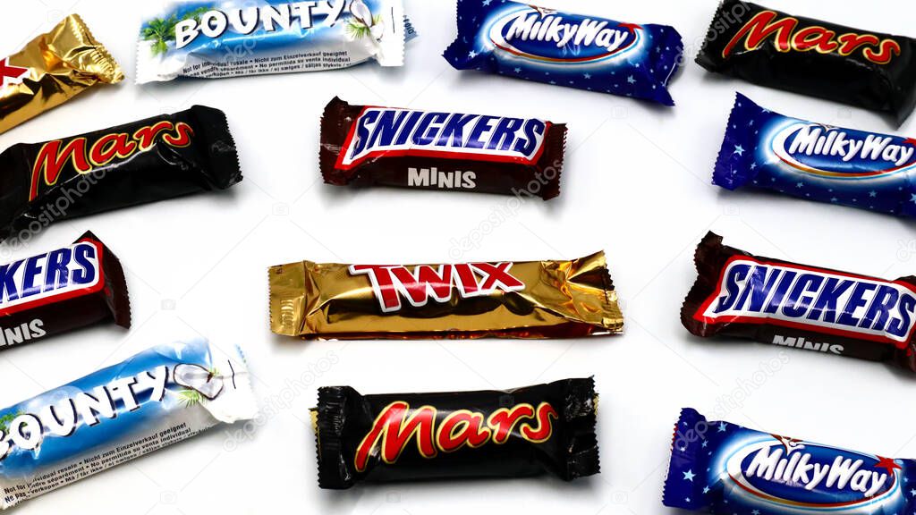 Rome, Italy  November 9, 2021: MARS, Twix, Bounty, Snickers and Milky way  chocolate bar isolated on white background. Mars is a brand of Mars Incorporated