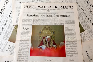 Vatican City, Holy See  February 11, 2013: Resignation of POPE BENEDICT XVI, Official Vatican Newspaper L'Osservatore Romano of February 11, 2013 clipart
