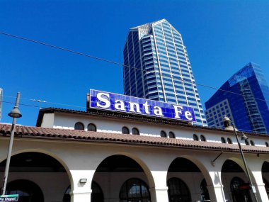 SAN DIEGO, California - September 12, 2018: SAN DIEGO, California - September 12, 2018: San Diego SANTA FE Depot Trains and Trolleys Station clipart