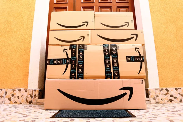 stock image amazon packages, boxes delivery to the door