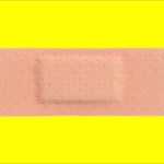 Various Strips of BAND AID PLASTER on blinking background