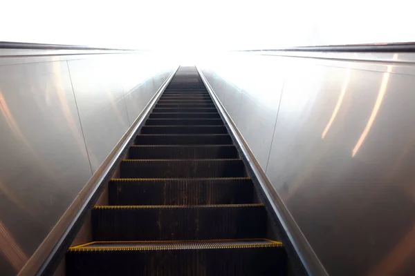 Modern Stairway electric Escalator of Subway, Mall, Indoor interior and Facility Building