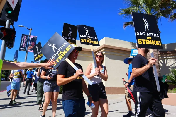 stock image Los Angeles, California, United States. 5th Oct, 2023. Striking Members of SAG-AFTRA and other union supporters picket outside Paramount Pictures on Melrose Ave. Nearly all television or film actors joined the Writers Guild of America 