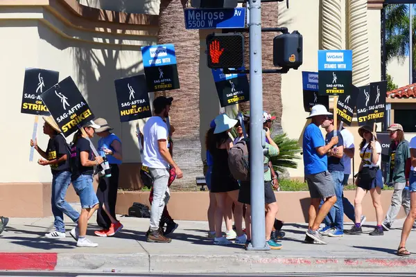 stock image Los Angeles, California, United States. 5th Oct, 2023. Striking Members of SAG-AFTRA and other union supporters picket outside Paramount Pictures on Melrose Ave. Nearly all television or film actors joined the Writers Guild of America 