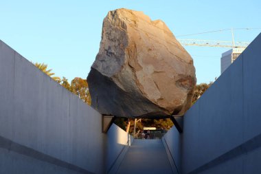 Los Angeles, California - October 13, 2023: Public Art LEVITATED MASS a sculpture by Michael Heizer at the LACMA, Los Angeles County Museum of Art clipart