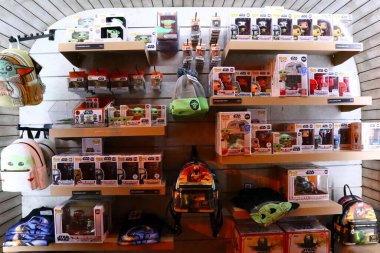 Hollywood, California - July 16, 2024: view o FUNKO POP Figurines on display at Funko Hollywood Store located at 6201 Hollywood Blvd, Los Angeles  clipart