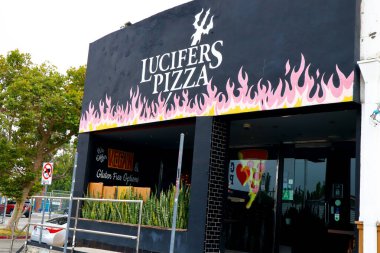 Los Angeles, California - July 9, 2024: Lucifers Pizza Restaurant, fresh delicious pizza with Gluten Free and Vegan options, located at 7123 Melrose Ave, Los Angeles  clipart