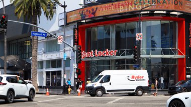 Hollywood, Los Angeles, California - July 9, 2024: RYDER Van on Hollywood Boulevard Walk of Fame. Ryder is an American transportation and logistics company clipart