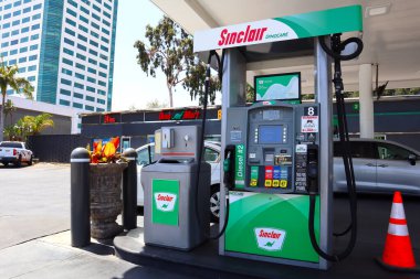 Burbank, California - June 18, 2024: Sinclair Gas Station, owned by HF Sinclair Corporation clipart