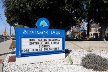 Carson, California  February 11, 2025: Stevenson Park and Community Center, public park with community center building and recreational area clipart