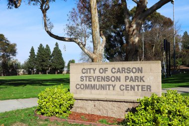 Carson, California  February 11, 2025: Stevenson Park and Community Center, public park with community center building and recreational area clipart