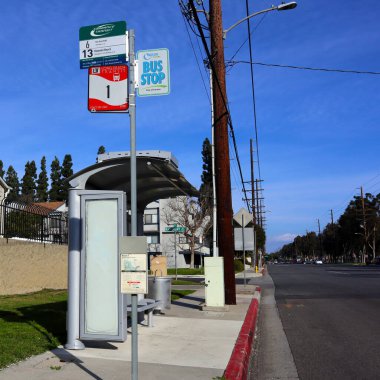 Carson, California  February 11, 2025: Bus Stop with Torrance Transit, Long Beach Transit, and Carson Circuit clipart