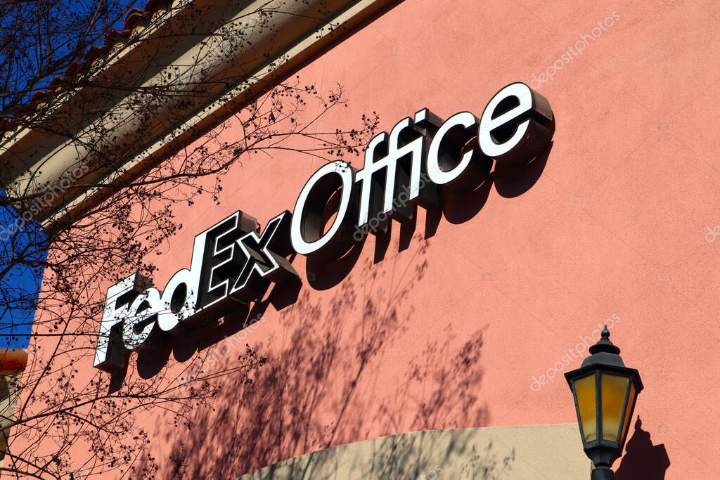 Norwalk, California - January 16, 2025: FEDEX Office sign, shipping and printing center