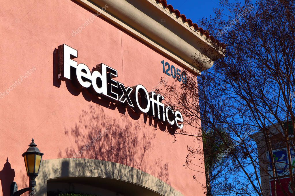 Norwalk, California - January 16, 2025: FEDEX Office sign, shipping and printing center