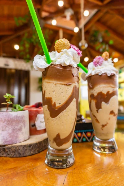 iced milkshake and chocolate in a glass
