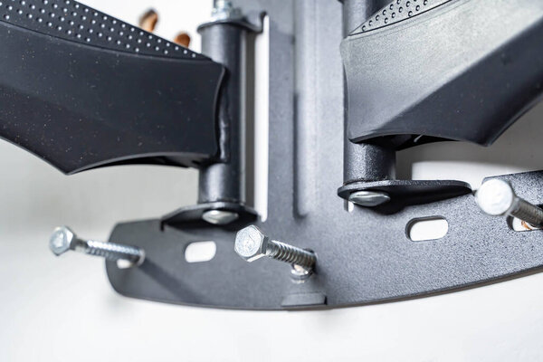 screws and TV wall mount base