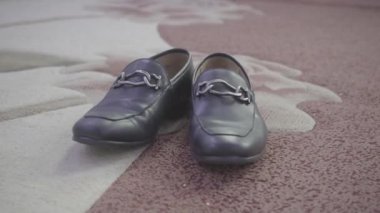 black man shoe, camera pan