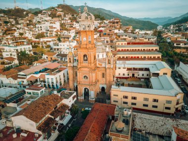 Front view of our Lady of Guadalupe church in Puerto Vallarta, Jalisco, Mexico at sunset high angle. clipart