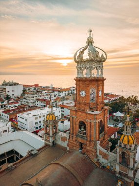 Vertical sunset view of our Lady of Guadalupe church in Puerto Vallarta, Jalisco, Mexico. clipart