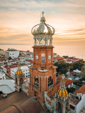 Close up aerial HDR image of our Lady of Guadalupe church in Puerto Vallarta, Mexico at sunset. clipart