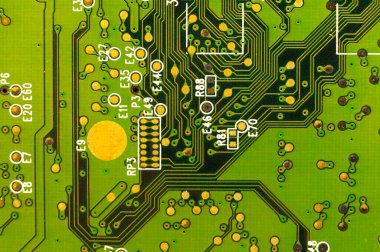 Green computer electronic circuit board close-up view