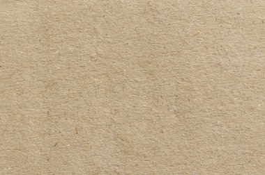 Sanat, tasarım ve zanaat uygulamaları için görsel unsurları geliştiren nötr bir renk içeren desenli geri dönüşümlü kağıt arka plan sunulmaktadır..