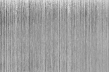 Fırçalanmış metal dokusu parlak ve modern endüstriyel bir estetik sağlar, arka plan ve tasarım elementleri için idealdir