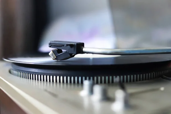 stock image Closeup of old fashioned turntable with vinyl record. Retro audio equipment