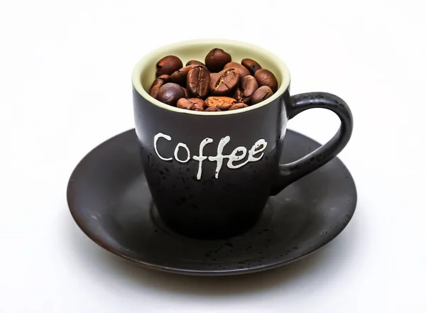 Σκούρο Κύπελλο Την Επιγραφή Καφές Κόκκους Καφέ Μέσα Λευκό Φόντο — Φωτογραφία Αρχείου
