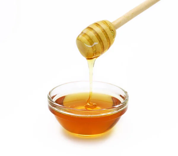 Wooden Spoon Dripping Honey White Background Shallow Depth Field — Stock Photo, Image