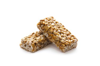 Beyaz arka plandaki tohumlardan Kozinak. Yakın plan.