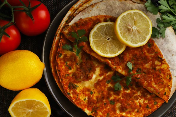 stock image Lahmajoun Lahmajo Lahmajoon - oriental dish of minced meat on a flatbread. Shallow depth of field