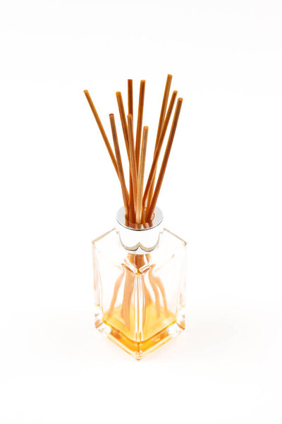 Incense or incense sticks in a decanter. Shallow depth of field