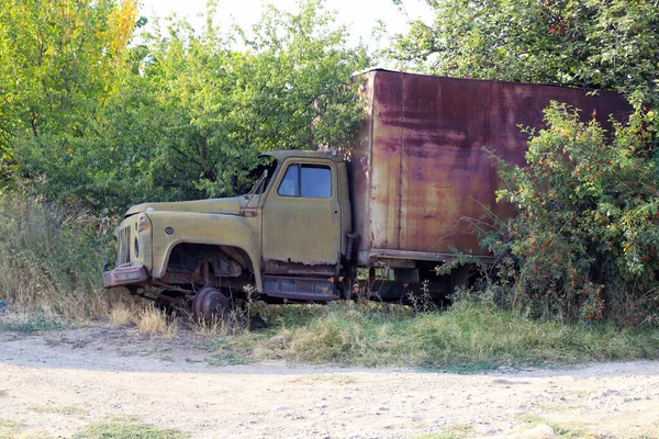 Cabin of an abandoned rusty truck of unknown brand