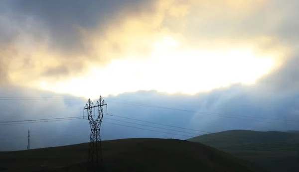 stock image Power lines on the background of the open sky