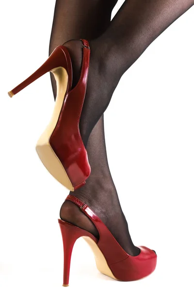 Пара Стройных Женских Ног Темных Чулках Красными Туфлями Высоком Каблуке — стоковое фото
