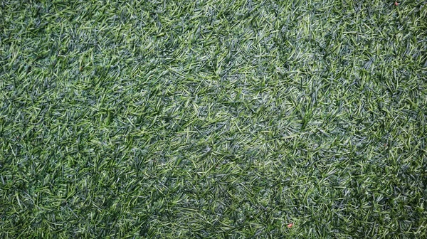 photos of green synthetic grass for wallpapers and backgrounds.