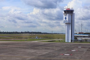 Batam, Riau Islands - Desember 3, 2022: Hang Nadim Airport ATC or navigation tower to prevent collisions, organize and expedite the flow of air traffic, and provide information and other support for pilots.