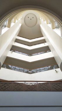 Interior view of atrium hall or foyer between modern between floor.