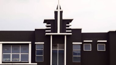 Modern residential or office window exterior in the middle of the city.