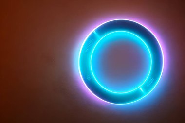 Wall bright blue circle neon light background and backdrop.