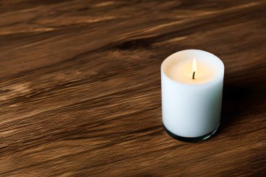 A captivating close up of a white candle capture the essence of relaxation, peace, elegance and grace for wedding, invitations, spiritual or religious project, including home decor, or any occasion